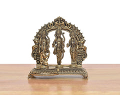 Brass ram darbar figurine set on ornate carved frame base with three standing deities
