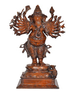 Brass Ganesha idol with raised 16 hands, seated posture on patterned base