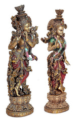 Radha Krishna resin statue set, side views of both figures with intricate jewelry and crowns