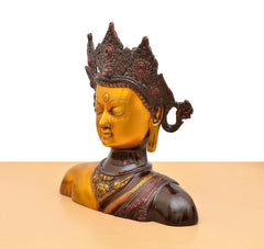 Buddha-Kopfstatue seitlich, goldene Gesichtsfarbe und braunes Kranzornament aus Messing