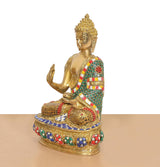 Brass Abhaya Mudra Buddha idol, raised hand gesture, multicolor jeweled robe, gold tone