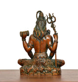 Superfine Brass Lord Shiva statue back view, flame-like hair, trident and drum visible