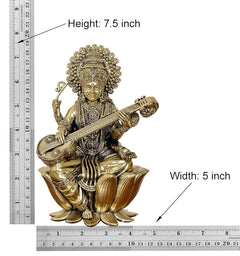 Brass Maa Saraswati on lotus with veena; height 7.5 in, width 5 in
