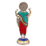 Rear view brass Dhanvantari statue, teal upper robe and red lower, round halo, blue base