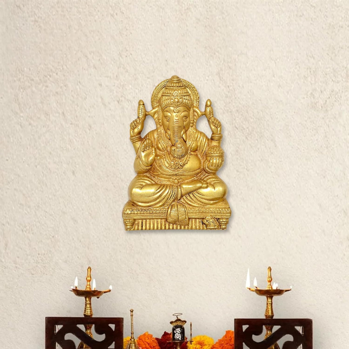Brass Ganesha wall hanging idol, seated with four raised hands, 7 inch height