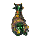 Brass Nandi bull statue back view, green torso with colorful embroidered-like artwork
