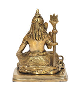 Brass Lord Shiva statue angled view, trident raised, detailed robe and ornaments