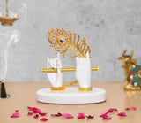 White Krishna Ji resin hands holding golden flute with decorative golden peacock headpiece