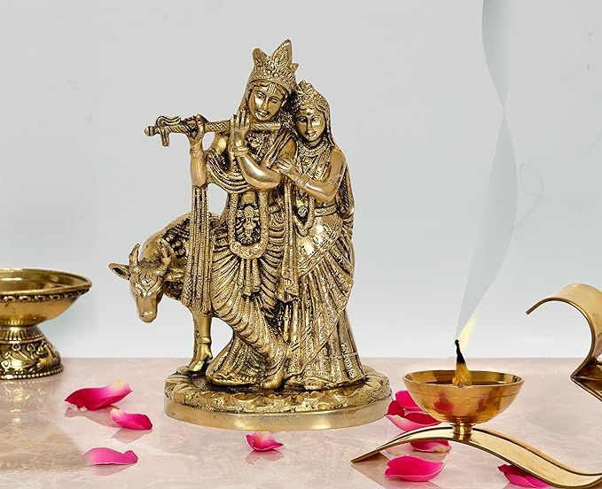 Brass Radha Krishna statue idol with Radha standing beside Krishna on a pedestal