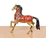 Brass running horse decor in profile, red saddle blanket with green and blue accents
