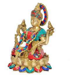 Lakshmi goddess statue, front-right angle, multicolor jeweled drape and lotus pedestal