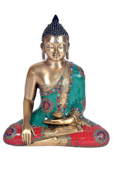 Seated brass Buddha statue with Bhumisparsha mudra, teal/red robe with jeweled patterns