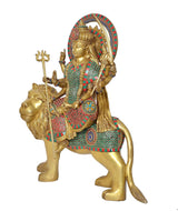 Brass Durga Maa figure on lion, side view, lion face with raised trident in hand