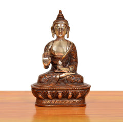 Brass Buddha idol seated front view, Abhaya mudra, ornate patterned base
