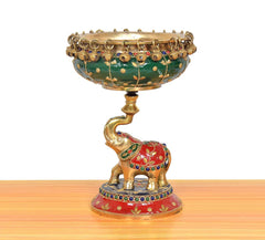 Brass elephant urli idol with painted cloth and jeweled rim, flower bowl on top