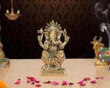Brass handcrafted Ganpati Bappa idol, front view with raised hands and detailed ornaments