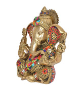 Gold-toned Lord Ganesha figurine seated with jeweled circular shoulders and crown