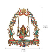 Ganesha swing idol dimensions: 18 in height, 15 in width, brass with mosaic base