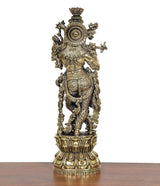 Lord Krishna brass sculpture statue, back view with halo-like back plate and finials