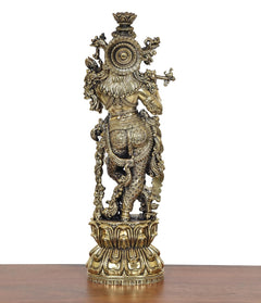 Lord Krishna brass sculpture statue, back view with halo-like back plate and finials
