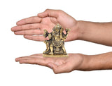 Brass Kal Bhairava pooja idol held in hands, small 3.5-inch statue on pedestal base