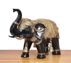 Brass elephant figurine, right-side view, black body with gold filigree and bells