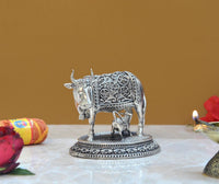 Brass cow and calf décor statue, front angle, engraved decorative band