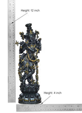 Lord Krishna flute figurine, dark brass, height 12 inch shown with ruler