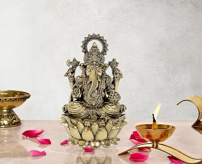 6 inch brass Lord Ganesha idol with ornate crown and lotus base