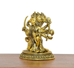 Golden brass Panchmukhi Hanuman statue, three-quarter view, detailed ornaments and weaponry