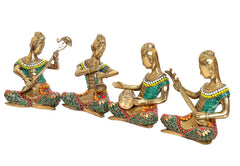 Four brass musician lady statues, cross-legged poses, teal dresses with colorful patterns