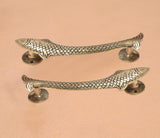 Golden brass fish door handles, matching long bars with circular mounting bases