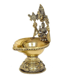 Brass Lakshmi diya oil lamp with attendants and flame cup on round pedestal stand
