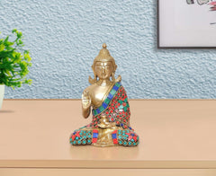 6 Inch Brass Buddha idol in Abhaya mudra, seated, multicolor inlaid robe