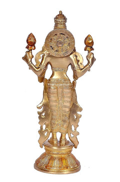 Brass Lakshmi statue from behind, detailed circular back ornament