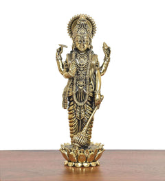 Superfine Brass Lord Vishnu idol facing forward, ornate jewelry and lotus base (7 in)