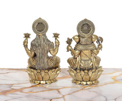Rear view of brass Lakshmi & Ganesha statue set (7 in), lotus base and adornments