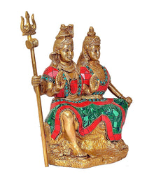 Brass Shiv Parvati idol statue, trident raised, ornate red-green clothing