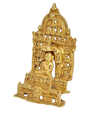 Brass Mahavir Swami figurine side view, ornate halo and engraved base