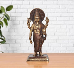 Brass Dhanvantri statue with halo and raised hands, standing figure