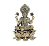 Brass Lakshmi statue idol front view, halo medallion, four arms on lotus
