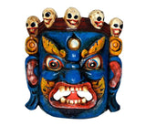 Front view deity wall mask, blue face with wide snarling mouth and golden brow
