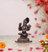 Copper Sharadamba Devi statue, side view, seated pose, four raised hands