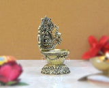 Brass Laxmi diya oil lamp with engraved detailing and domed base, 4-inch height