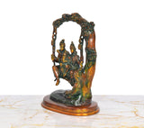 Brass Shiva Swings murti with Parvati and Ganesha, rear-side view
