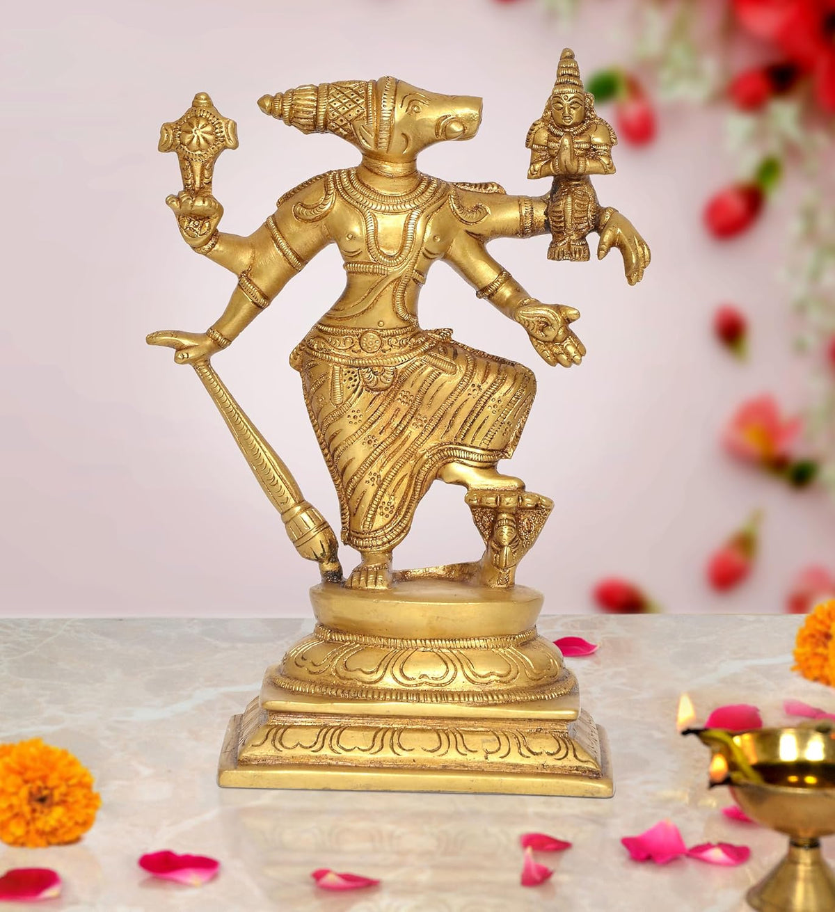 Brass Varaha Lakshmi Varaha statue holding Bhudevi, ornate multi-armed deity pose