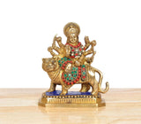 Brass Durga on lion figurine, multicolor jewelry on arms and dress, standing stance