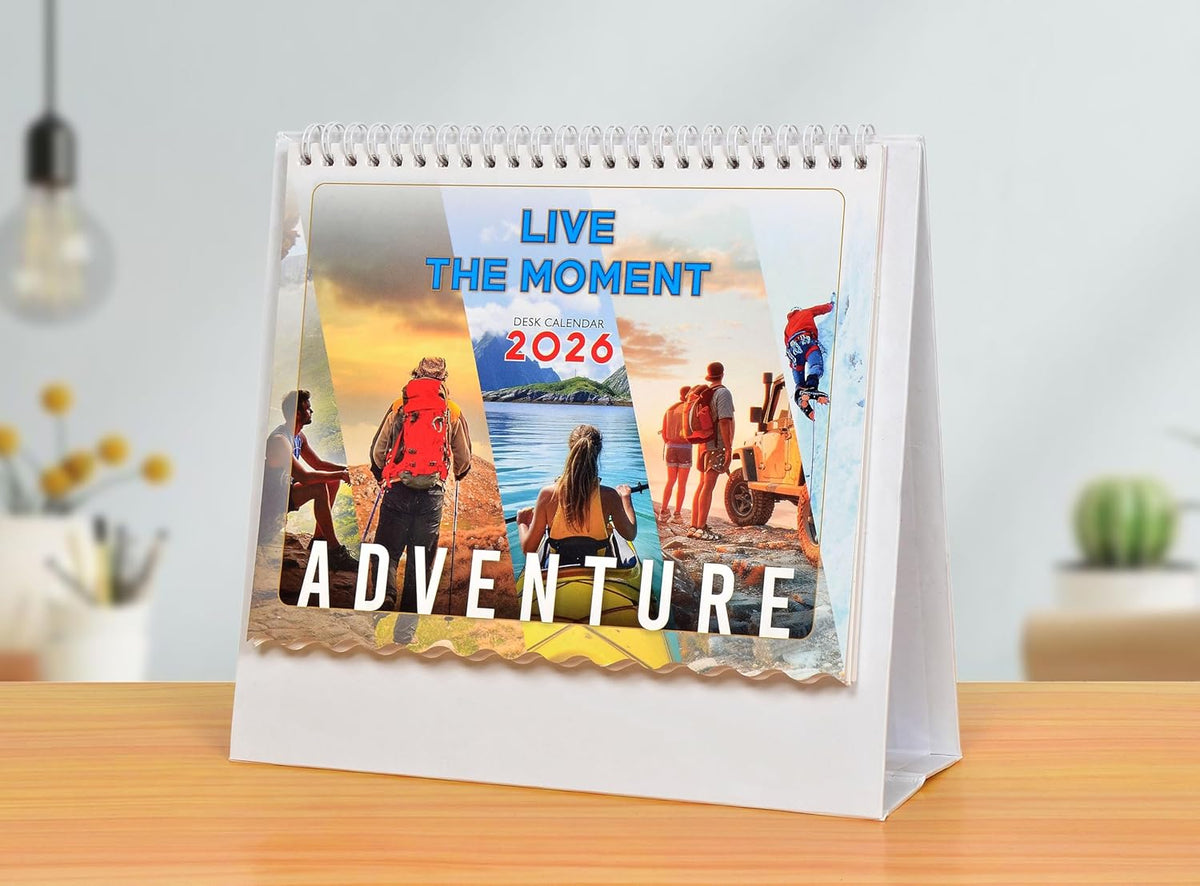 2026 desk calendar with “Live the Moment” adventure cover and spiral binding