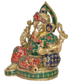 Lord Ganesha figure seated on base, blue-and-red patterned robe with gold hands