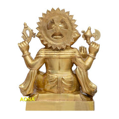 Back view of sitting Lord Ganesha brass figurine with halo-like crown detail, height 31 in.